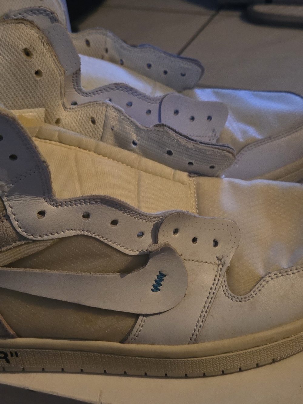 White Low-Top Sneakers with Blue Stitch Accent